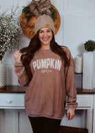 Happiness Trails Boutique - Pumpkin Spice screen printed on a taupe corded sweatshirt