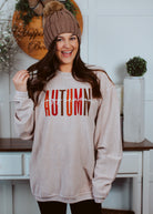 Happiness Trails Boutique - Autumn cozy season screen printed on a corded taupe sweatshirt